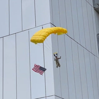 Skydiving parachute with waving american flag.