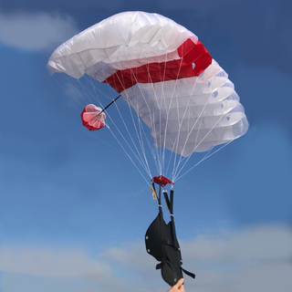 Red and white base jumping canopy parachute toy.