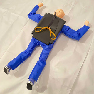 Radio controlled paratrooper in freefall position.