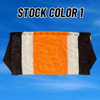 Orange black white parachute.